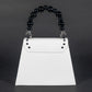PEARLA HANDBAG | WHITE SNAKE, BLACK PEARL HANDLE